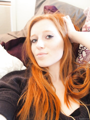 Gorgeous redhead Wanda shows us her nice body 1 of 2