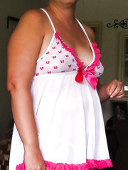 Chubby sexy wife poses for pictures then gets naked