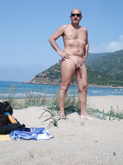 Naked on the beach hoping to be seen by others