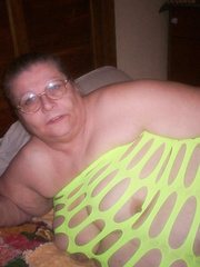 mature bbw amateur feeling sexy in a green dress