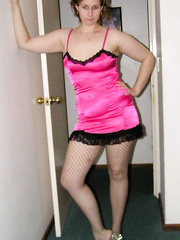 sexy housewife posing in sexy pink lingerie
