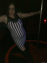 Pole dancing at a swingers club