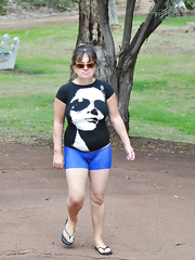 Ann walking in public with painted on shorts exposing her breasts