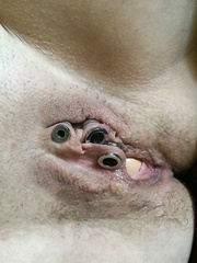 Ann pushing hard eggs out of her bald pussy with piercings