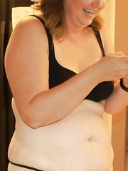 Bulky hawt wife shows off in her dark brassiere and belt pants