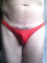 Disrobe red pants to undressed body with upright weenie