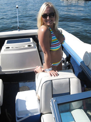 Breasty golden-haired bursting out of bikini top on boat engulf and gulp