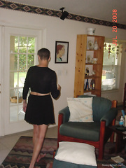 This Babe wore dark top,ding-dong short petticoat,strapon no pants or brassiere