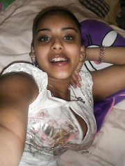 Indian solo gal pops out her large zeppelins during a set of candid scenes from home