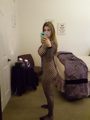 Large titted dilettante takes naked and semi-naked selfies around her abode