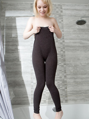 Cute legal age teenager hotty slides off her yoga panties in the shower to pose undressed