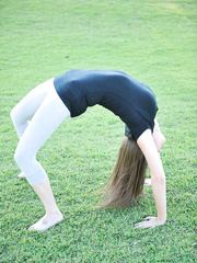 Nerdy legal age teenager hotty takes off her yoga panties to expose her taut wazoo and hairless twat