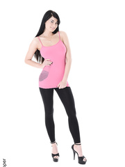 Darksome haired model Lucy Li uncovers her pretty wobblers as that babe undresses exposed