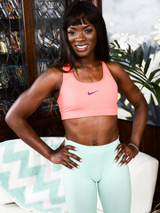 Swarthy dilettante Ana Foxxx sheds her workout clothing and shoes to model in nature's garb