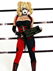 Breasty cosplay beauty undresses her suit to show her cartoonish proportions