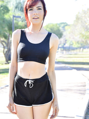 Built hottie takes off her shorts and sports brassiere to do yoga in the in nature's garb