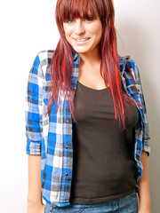 Redheaded nerd exposes her priceless wobblers after donning micro petticoat in glasses