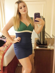 Golden-Haired non-professional with natural scones pulls out her phone for exposed selfies