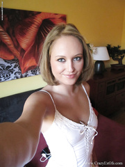 Non-Professional golden-haired takes self shots of her tan lined tits as that babe acquires naked