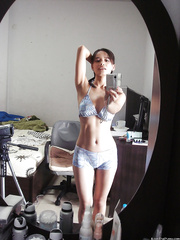 Playful Oriental hottie Lana Selfshot demonstrating trimmed vagina and fingering