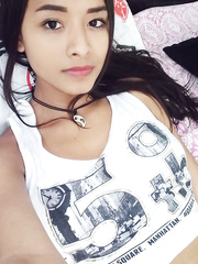 Sexy exotic looking cutie Liloo takes self shots during the time that posing in the undressed