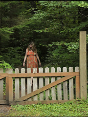 Non-Professional model Palatable Trixie releases her large naturals from suit in the yard