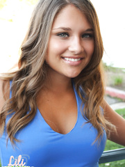 Cute legal age teenager Lili Jensen slips her petticoat over her belt overspread booty