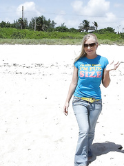 Golden-Haired beach sweetheart Britney Brooks posing fully dressed in denim jeans