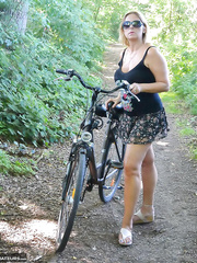 Breasty cumbrous aged Chrissy bicycling topless with her giant large scoops swaying