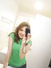 Cute ex-girlfriend Evilyn Fierce showing off petite zeppelins whilst taking selfie
