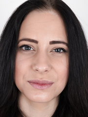 Darksome haired female with a firm face model in the in nature's garb for the 1st time