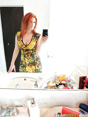 Dilettante redhead cutie Rainia Belle makes hawt,strapon amusing self shots