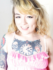 Tattoo enthusiast Felicia Fisher releases her natural bawdy cleft from pink pants