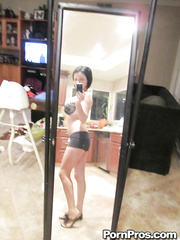 Black haired sweetheart Loni Evans snaps selfies whilst stripping in front of mirror