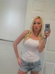 Blond honey Madison Scott takes selfies as this babe disrobes with a sex doll