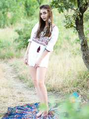 Juvenile hippy hotty Elis acquires naked outdoors on a blanket to pose undressed