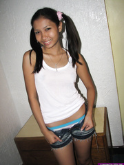 Little non-professional Oriental legal age teenager coyly shows her diminutive marangos and receives absolutely stripped