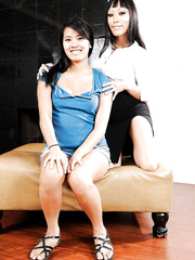 Oriental females Gaia and Angelina Chung take turns coaxing ball cream from 10-Pounder