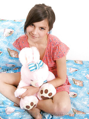 Small legal age teenager puts down her stuffed beast previous to getting gangbanged on ottoman