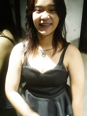 Cute Thai hotty in braces and flip flops lounges about in her shorts and blouse