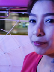 Tattooed Thai female with large scoops receives team-fucked by a foreigner in motel room