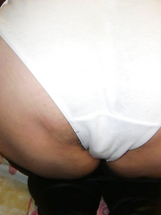 My hairy wife showing her charms in white breeches waiting to like
