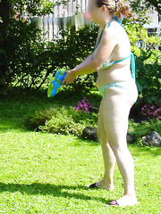 My sexy sister in-law showing off her chubby body and doing her chores