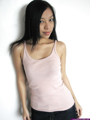 Slim Oriental gal discloses her teensy bazookas and tiny gazoo on her knees