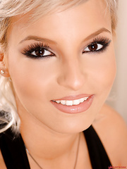 Breathtaking golden-haired angel caresses ideal milk cans and show in nature's garb love tunnel close up