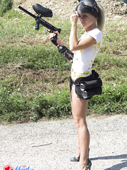 Dilettante female Meet Madden plays paintball in just her white pants and shirt