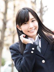 Fascinating Japanese schoolgirl pulls down pants showing stripped butt in the library