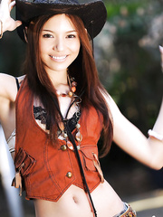 Enjoyable teenage oriental cowgirl with skinny legs stripping off her garments