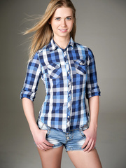 Legal Age Teenager solo model Violette Pink bares her flat chest previous to slipping off shorts