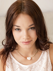 Cute face Nici Dee undresses pink pants to show hairless pink love tunnel